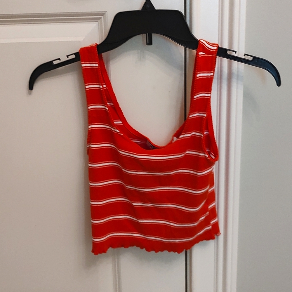 Size s orange cropped tank top. Lightly worn.